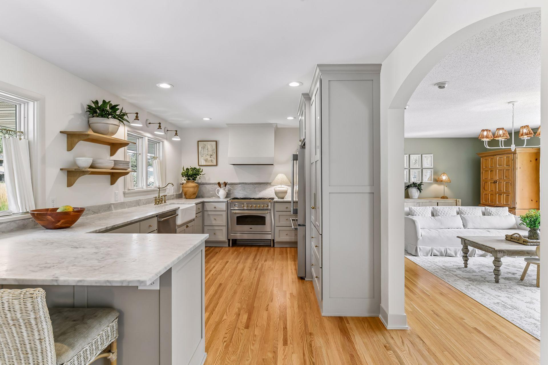 Introducing 15803 Holdridge Road East in Wayzata, Minnesota. Nestled on a private 1.3-acre lot, this inviting one-story home offers four bedrooms, three bathrooms, and 2,758 finished square feet of living space.