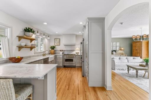 Introducing 15803 Holdridge Road East in Wayzata, Minnesota. Nestled on a private 1.3-acre lot, this inviting one-story home offers four bedrooms, three bathrooms, and 2,758 finished square feet of living space.