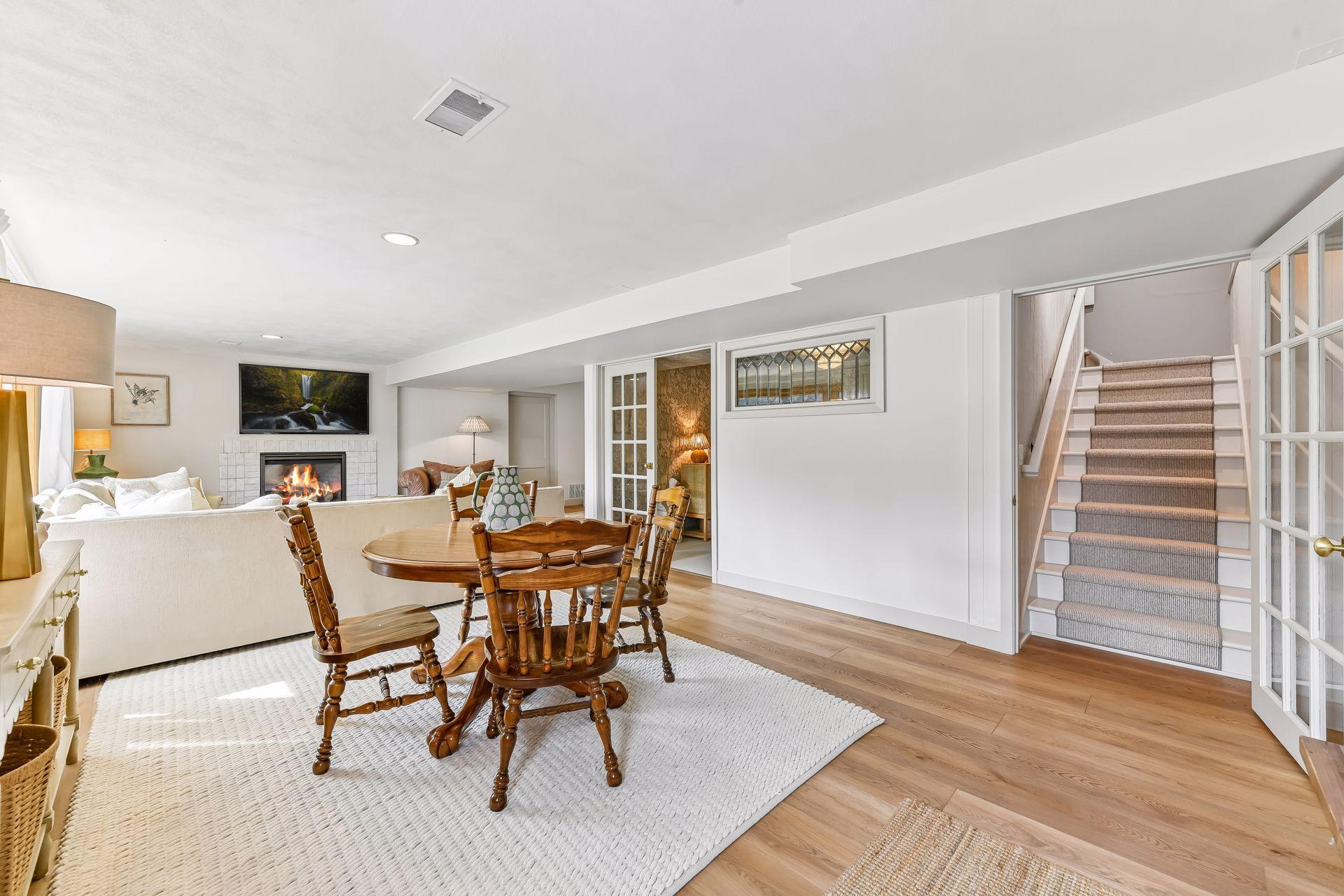 The walkout lower level expands the living space with a family room, gas fireplace, game area, home office (or playroom), fourth bedroom, and three-quarter bathroom.