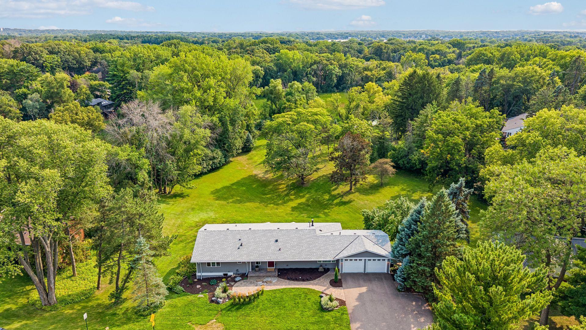 Ideally located just minutes from Downtown Wayzata, offering boutique shopping, lakeside dining, and the recreational amenities of Lake Minnetonka.