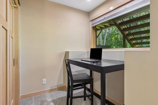 Study nook in lower-level bedroom #3 with a generous lookout window and a large closet.