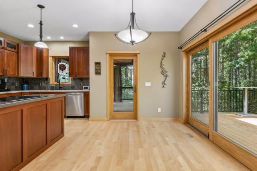 A large area provides room to extend your dining area and access to the deck and screen porch.
