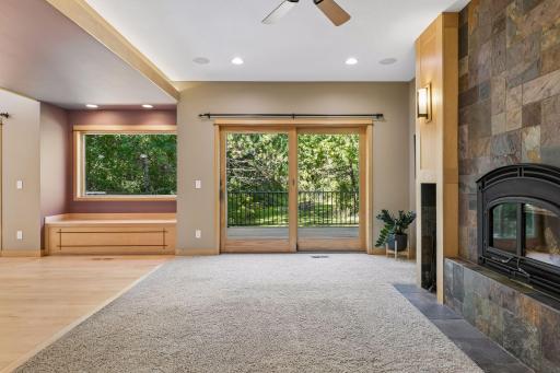 What a view of the lush green back lawn. Maple millwork with cherry inlays in the window seat.