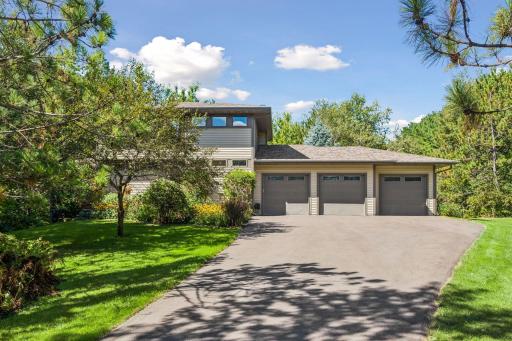 3-car garage that is finished with a gas heater and 3 garage door openers.