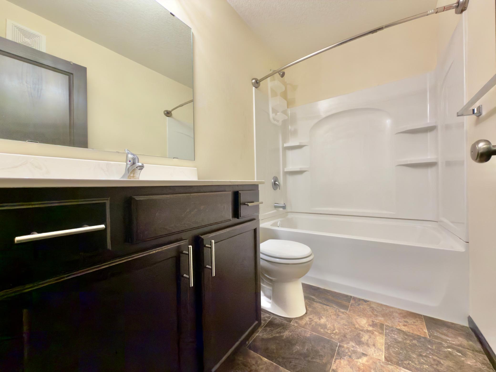upper full sized bath and shower