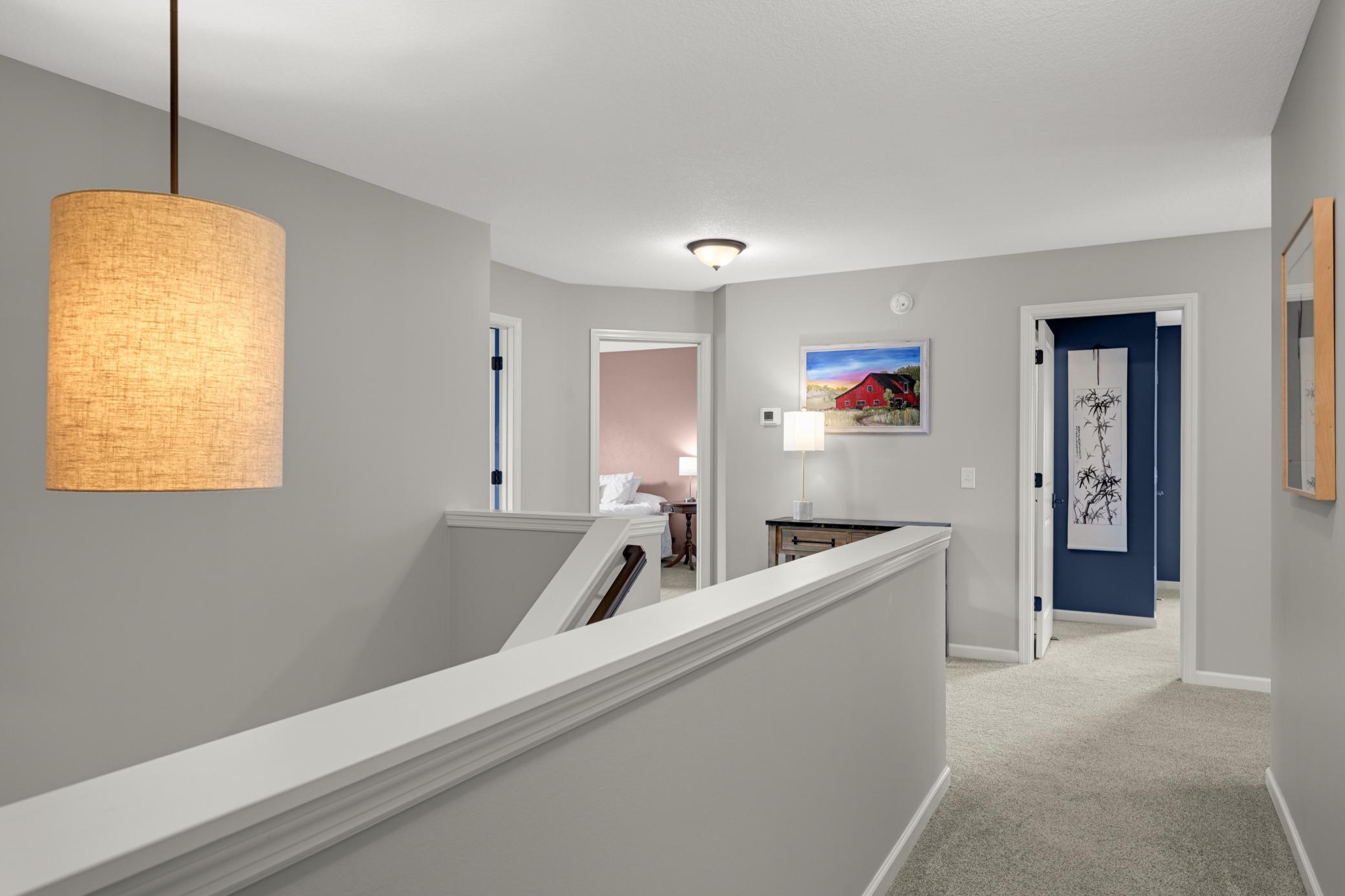 A light-filled staircase connecting all the living space this floor plan offers.