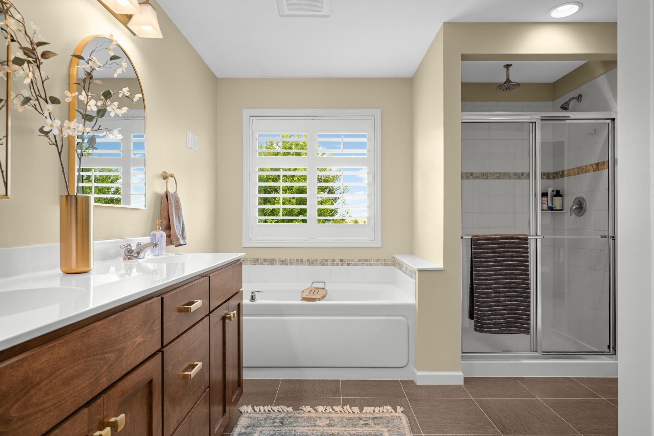 Sink into the separate soaking tub after a long day.