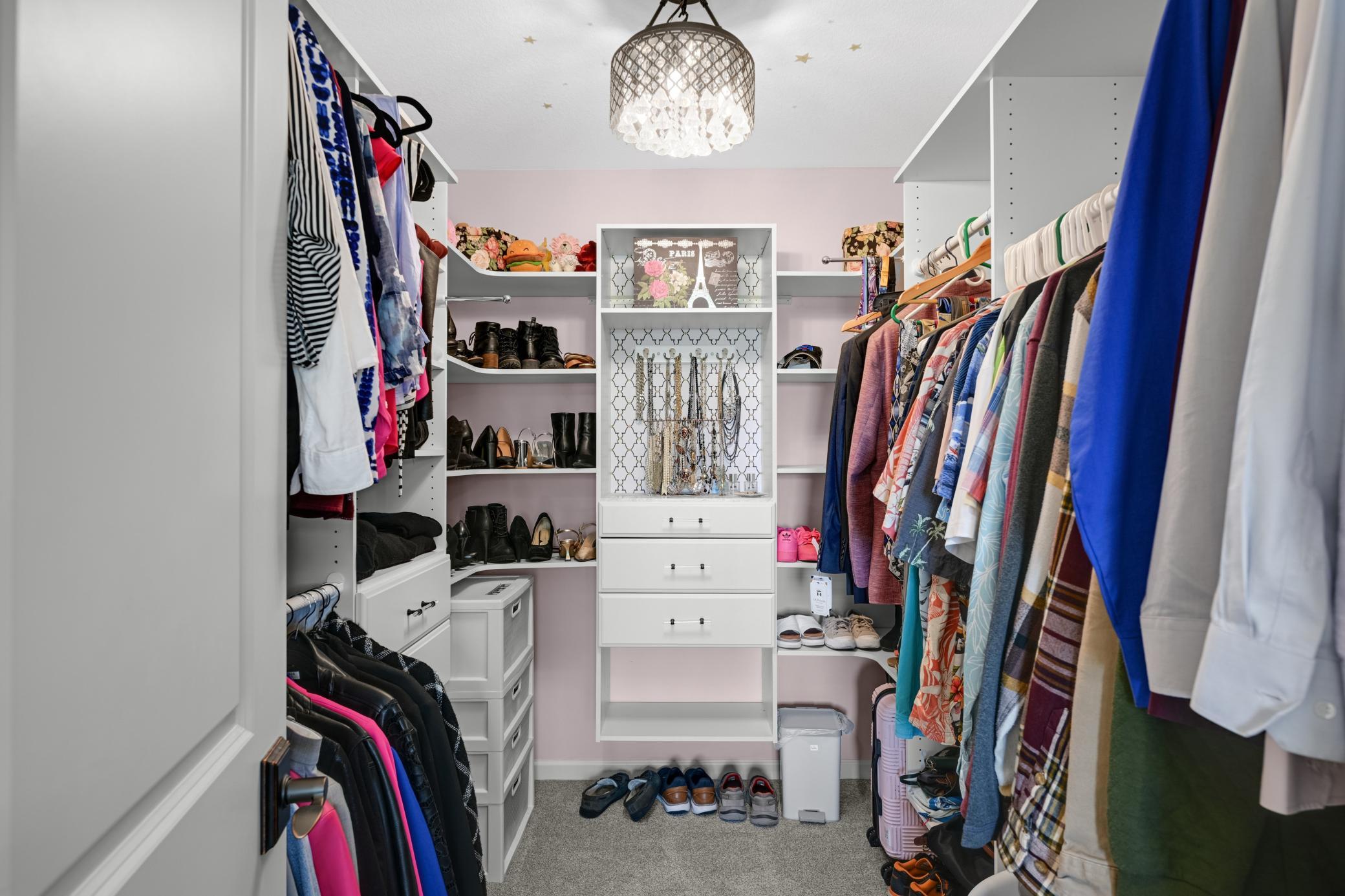 Enjoy a perfectly organized primary closet that feels so high-end and luxe.