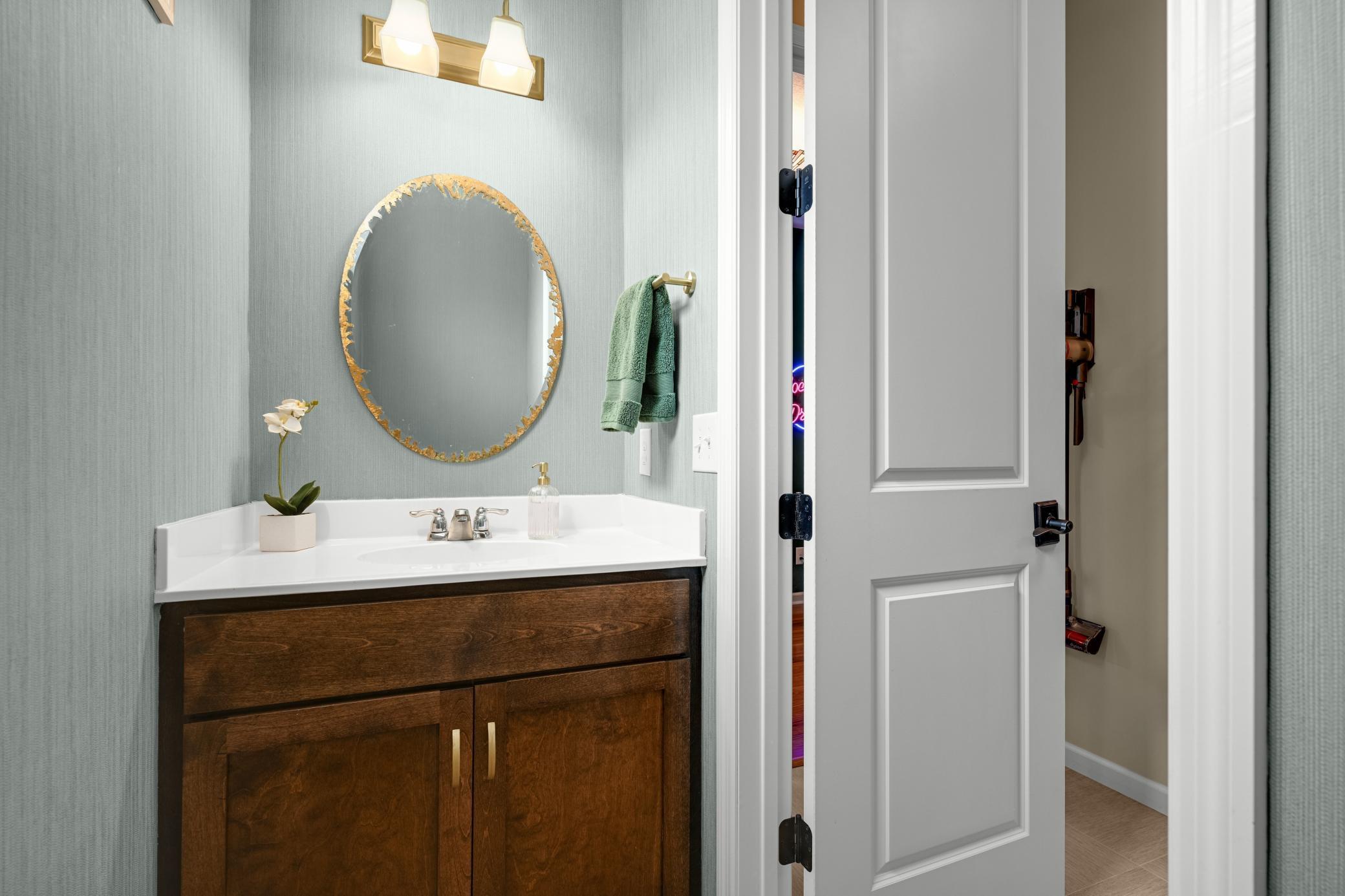A stylish main-floor powder room your guests will quietly admire