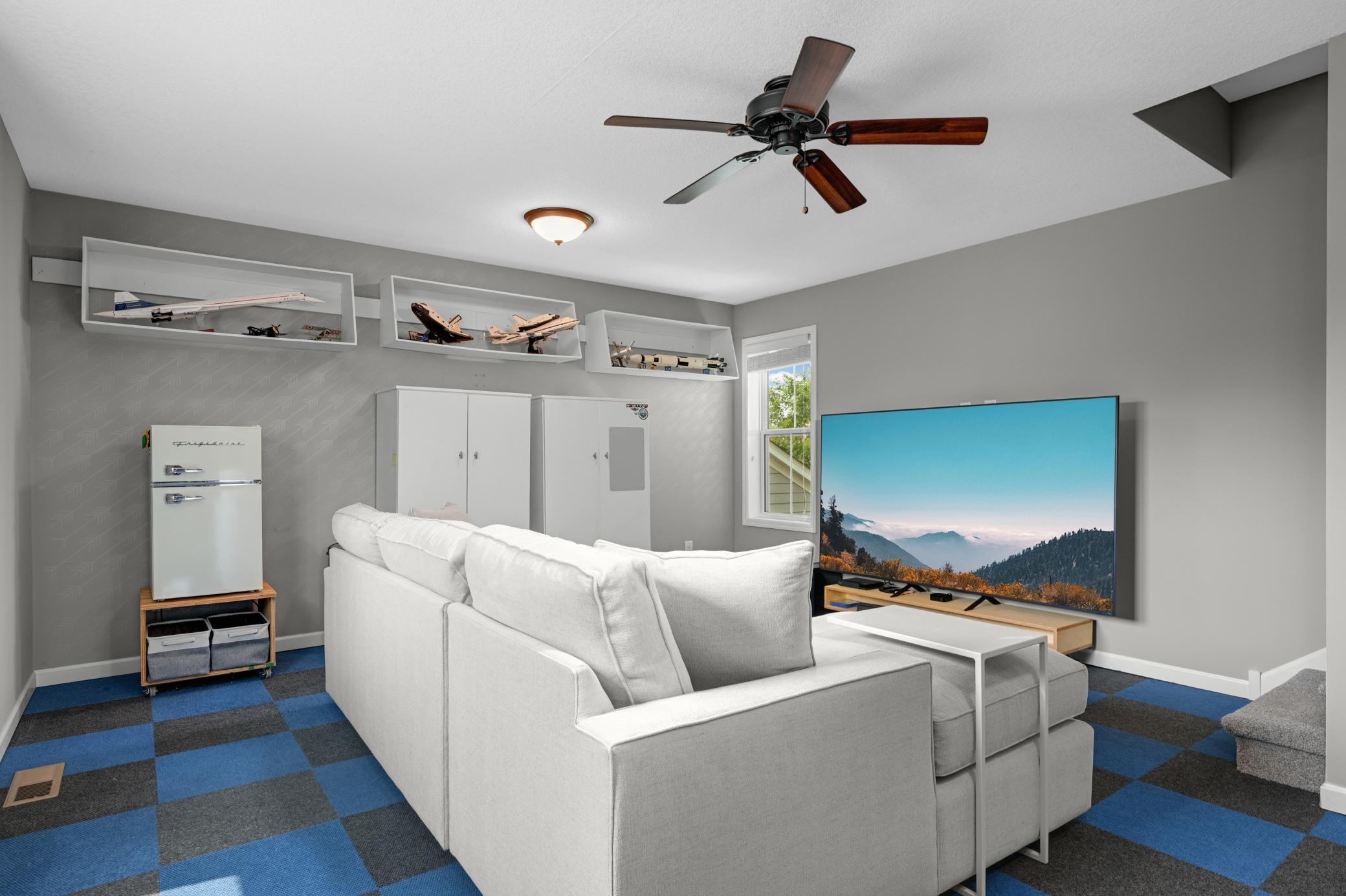 The Bonus Room features incredible built-ins and the uses for the space are endless.