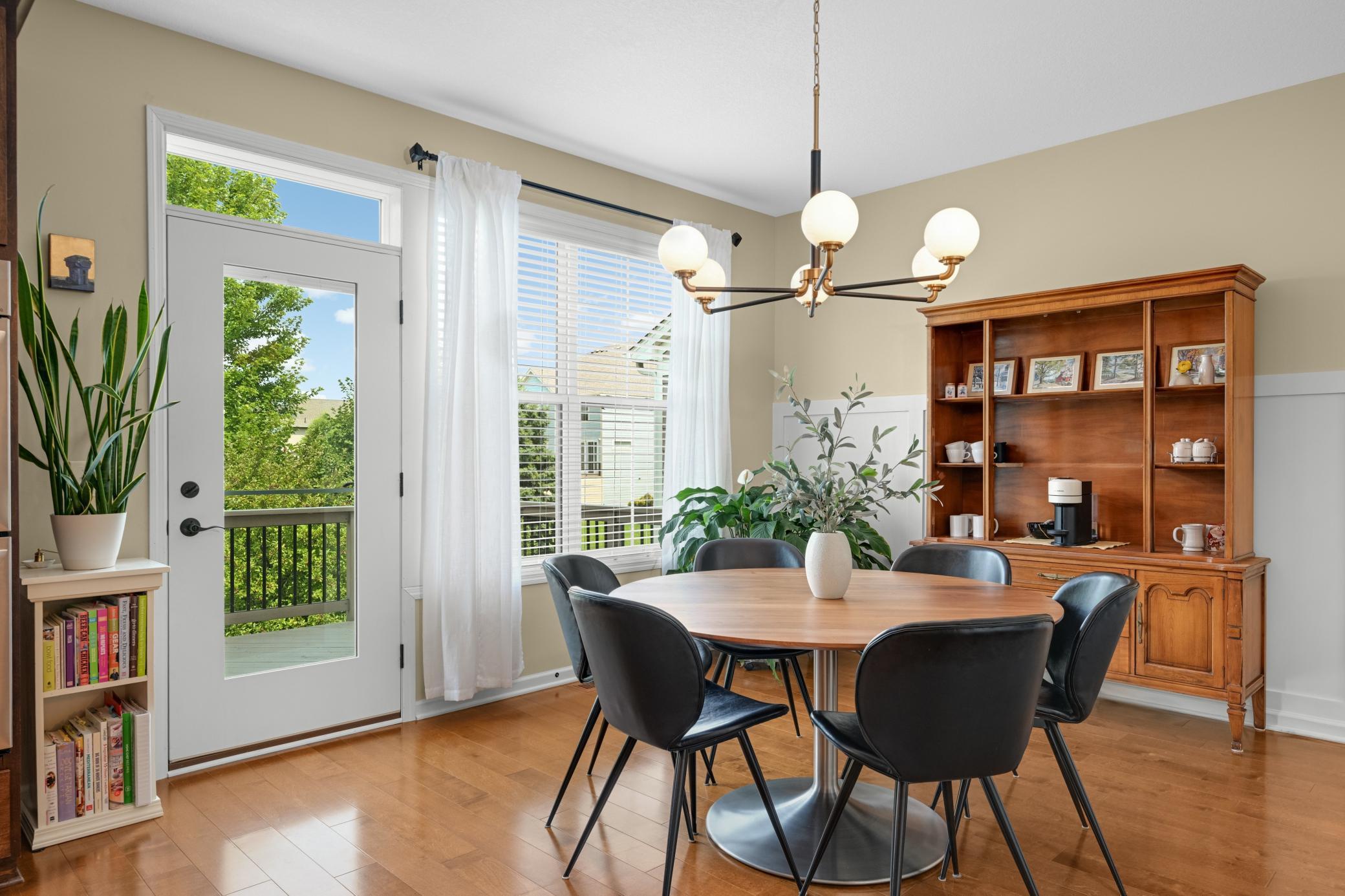 The door leading to the spacious deck was just replaced and the natural light flooding the dining room is incredible!