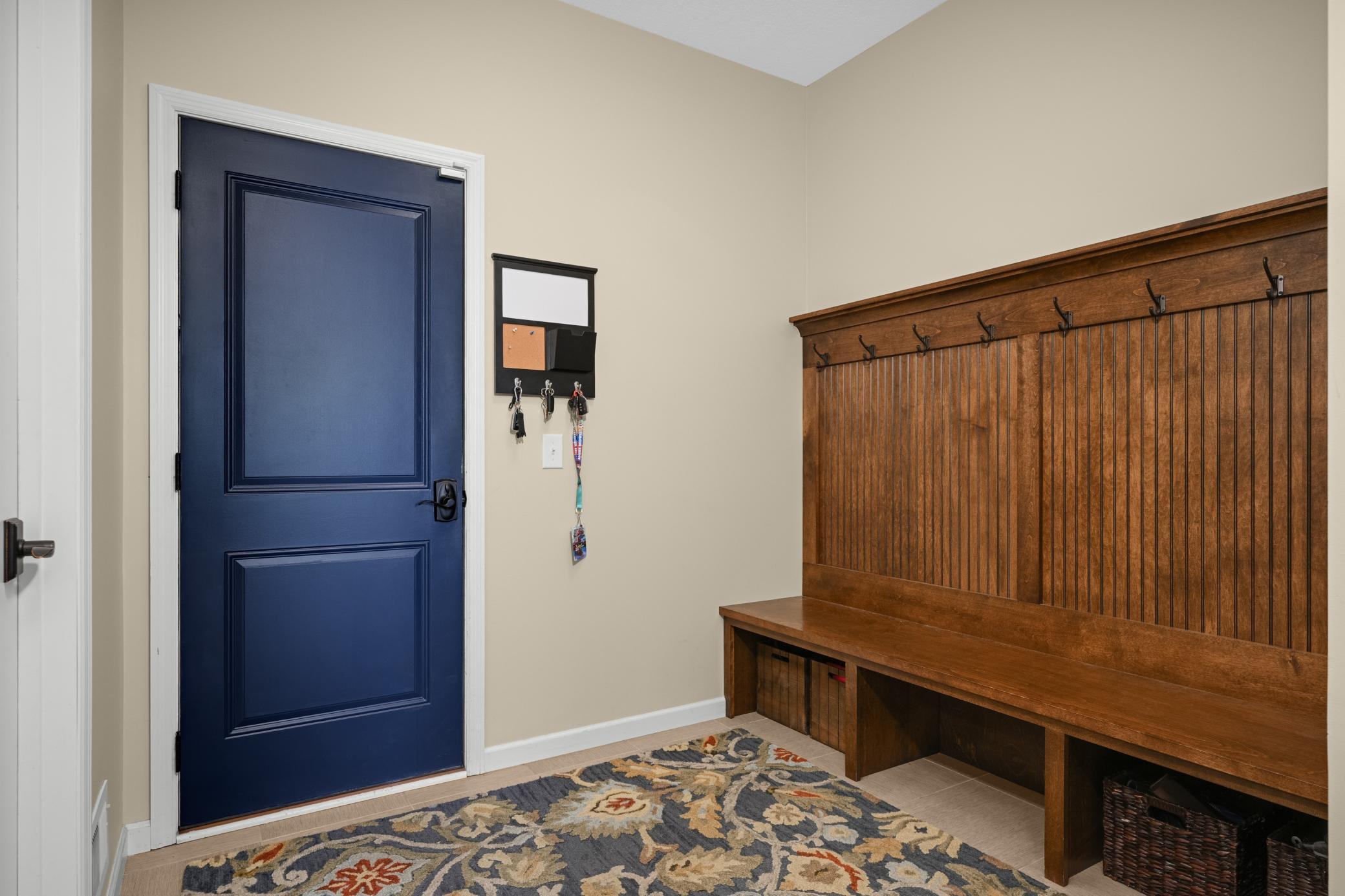 A spacious mudroom keeps the everyday coming-and-going tidy and organized.