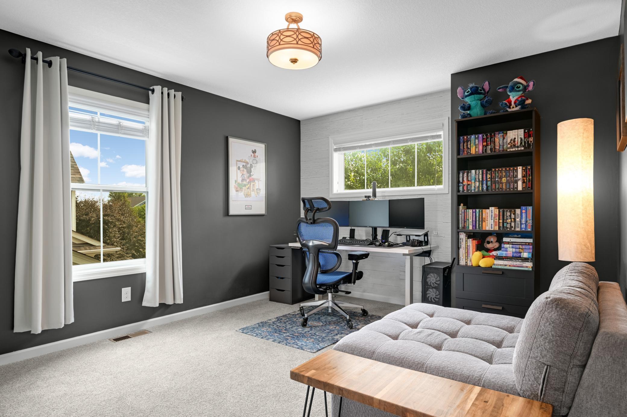Bedroom three overlooks the front of the home and is currently being used as an office.