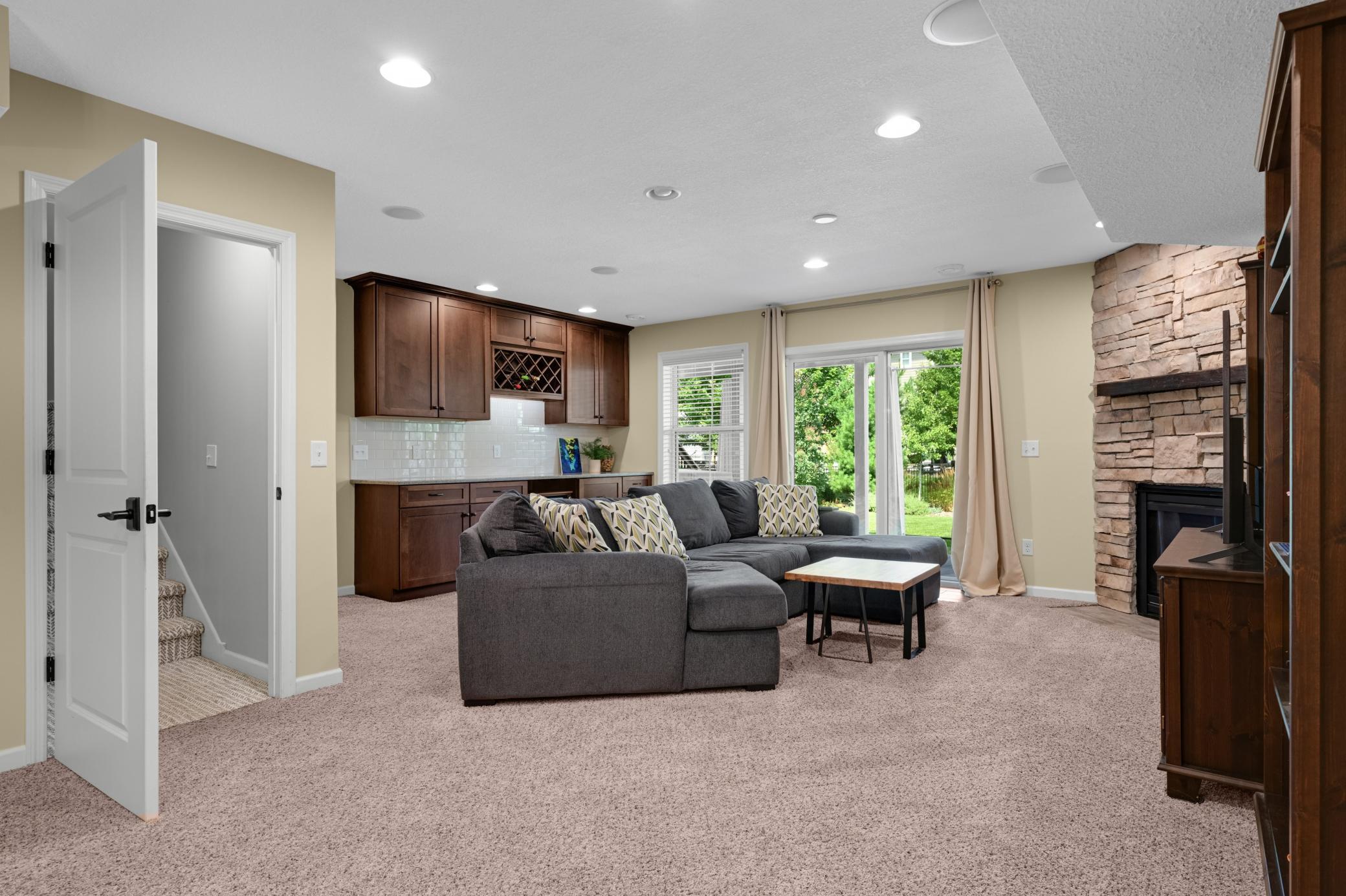 Head down to a walkout lower level built entirely for entertaining.