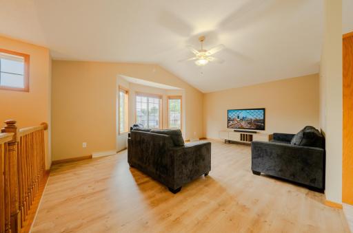 Living room with window natural light and ceiling fan