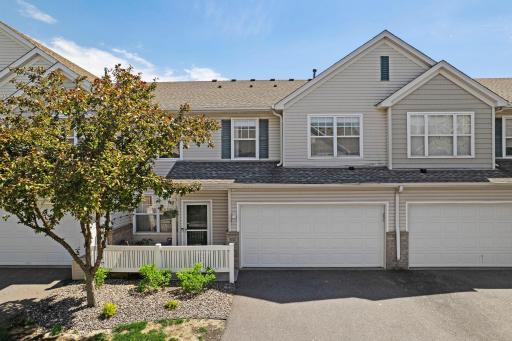 Welcome to this charming 2-bedroom, 3-bathroom townhouse nestled in a quiet Maple Grove community.