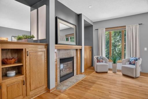 2 sided fireplace adds ambiance to the dining spaces.