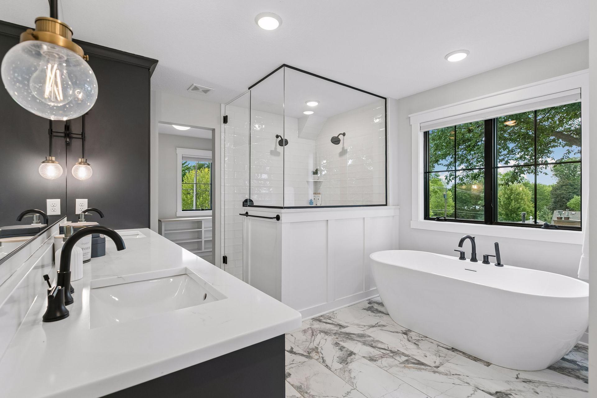 Primary full bath with dual sinks, and closets