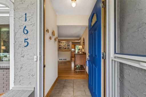 Gleaming hardwood floors welcome you