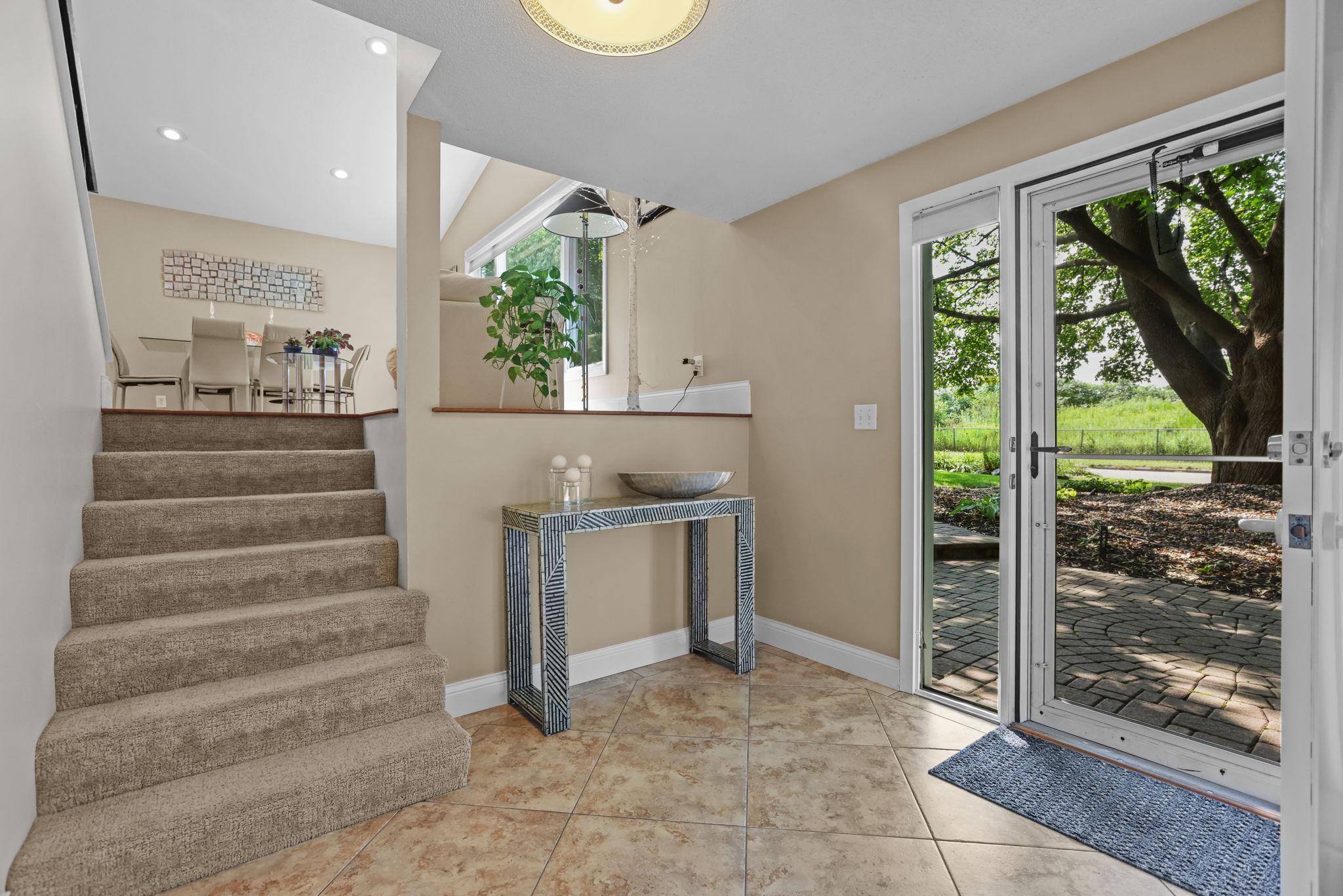 Foyer view towards street and dining room
