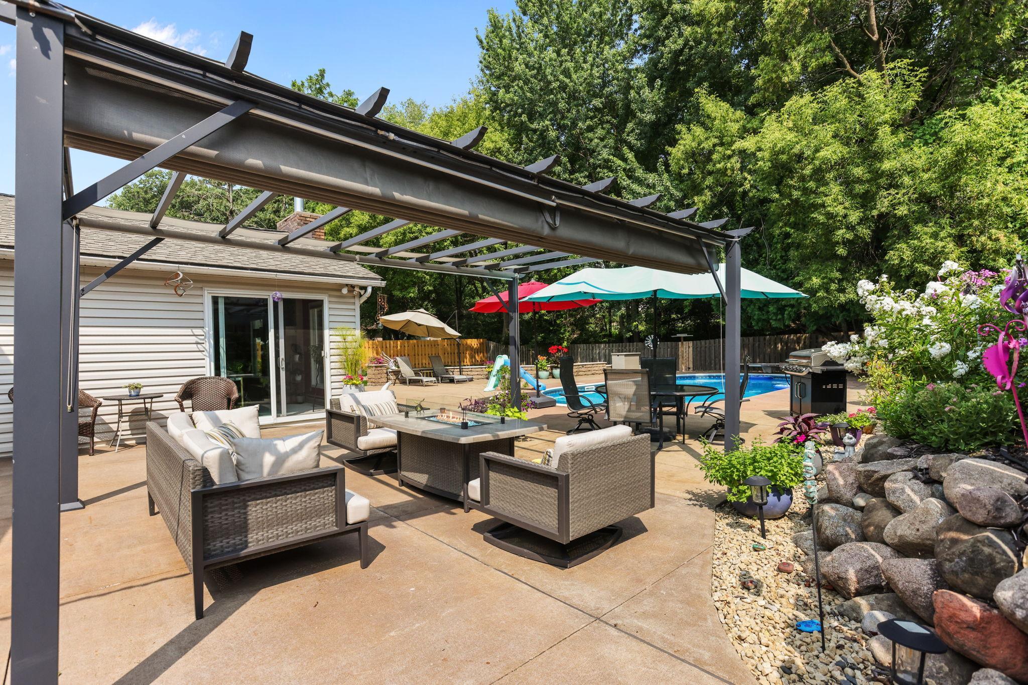 Patio lounge, dining area and pool