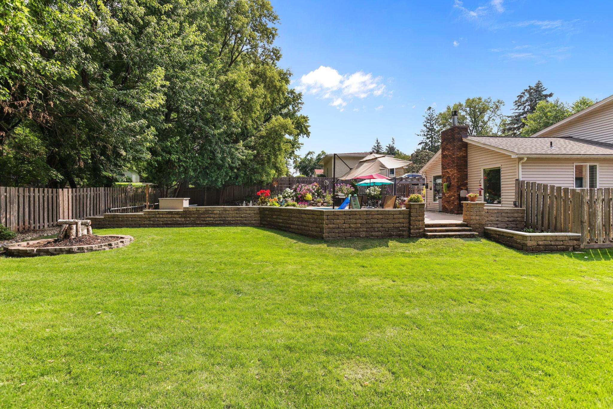Large yard complete with in ground irrigation, established perennials