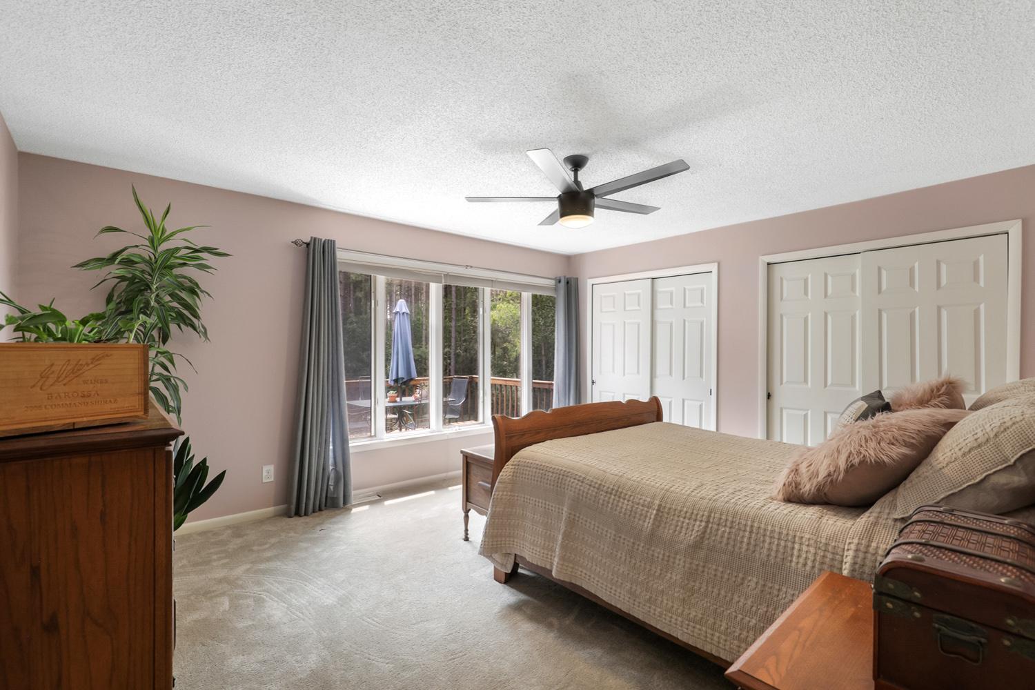 Primary bedroom with great views of the backyard