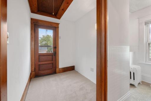 This little bonus space in the hallway would be nice for a little reading nook, a desk, or a vanity.