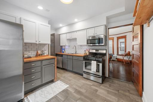 The kitchen is modern with a nice layout. There is plenty of room to add additional counterspace as well.