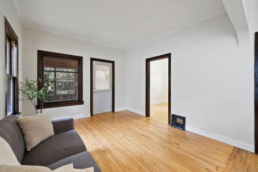 Living looking into porch & bedroom