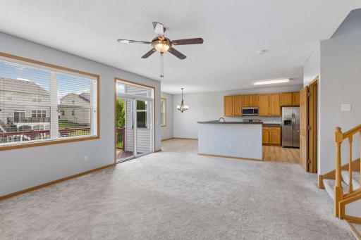 Open concept living area with access to the deck