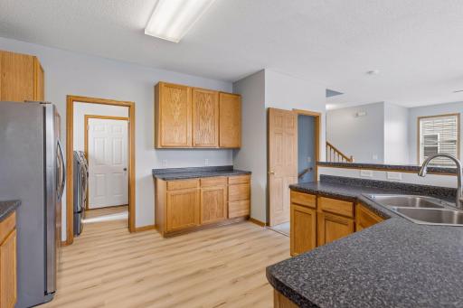 Spacious kitchen featuring so much storage