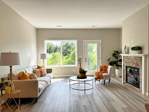 Wonderful living room - add the fireplace if like to include a surround and mantel. Choose from recessed lighting, fan and light. Even vaulted if prefer! Photos from similar home.
