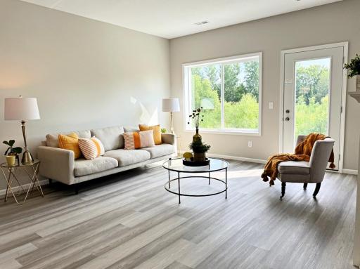Wonderful living room - add the fireplace if like to include a surround and mantel. Choose from recessed lighting, fan and light. Even vaulted if prefer! Photos from similar home.