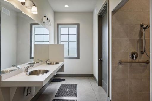 Convenient shower and bathroom facilities in the resident center make it easy to rinse off after a swim or freshen up post-workout at the fitness center.