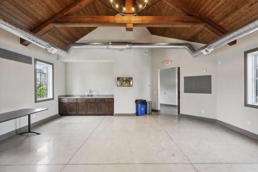 This spacious party room includes a wet bar sink area, perfect for serving guests at your next event, and the community keeps the calendar full with year-round activities.