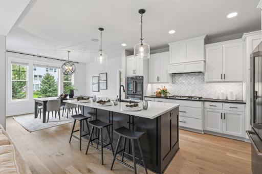 A show-stopping kitchen with an open sightline to the dining room — the heart of the home for gathering and entertaining.