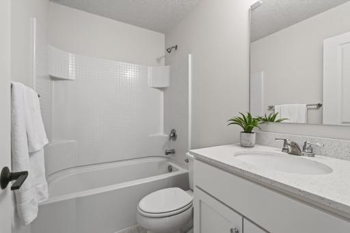 Full bathroom that is private to the 2nd bedroom.