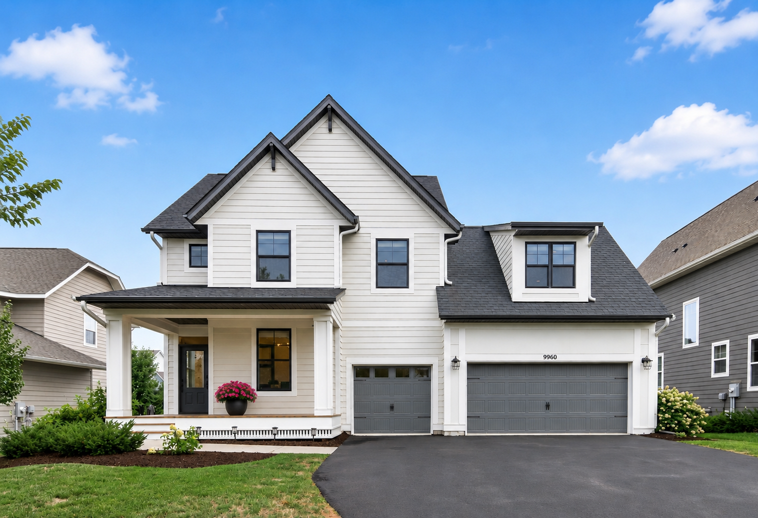 Photo for 9960 Arrowwood Trail, Woodbury, MN 55129 - Listing #7124491 Stunning front exterior with James Hardie concrete siding for lasting durability and timeless curb appeal, complemented by beautiful landscaping and a fenced yard.
