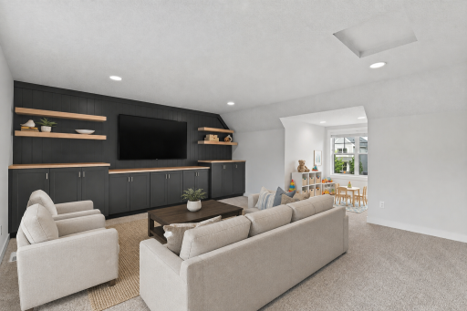 The ultimate hangout spot; bonus room over the garage with custom built-in cabinets for movies and games. Virtually Staged