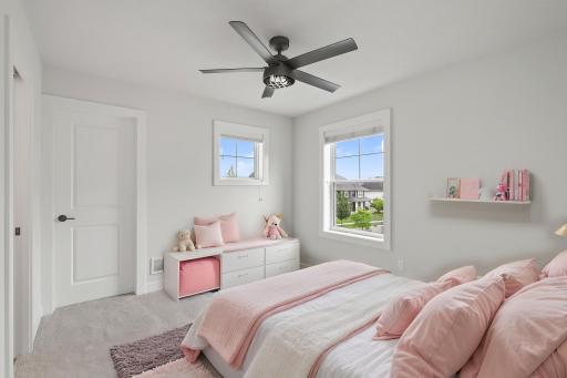 Third bedroom offers a convenient Jack-and-Jill bathroom configuration plus a large walk-in closet. Virtually Staged
