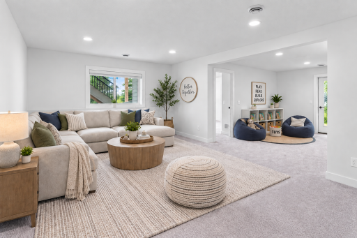 Lookout basement family room is perfect with sitting areas, a wet bar and a 5th bedroom with bathroom! Plus a huge sports court making this into the ultimate hang out home! Virtually staged.