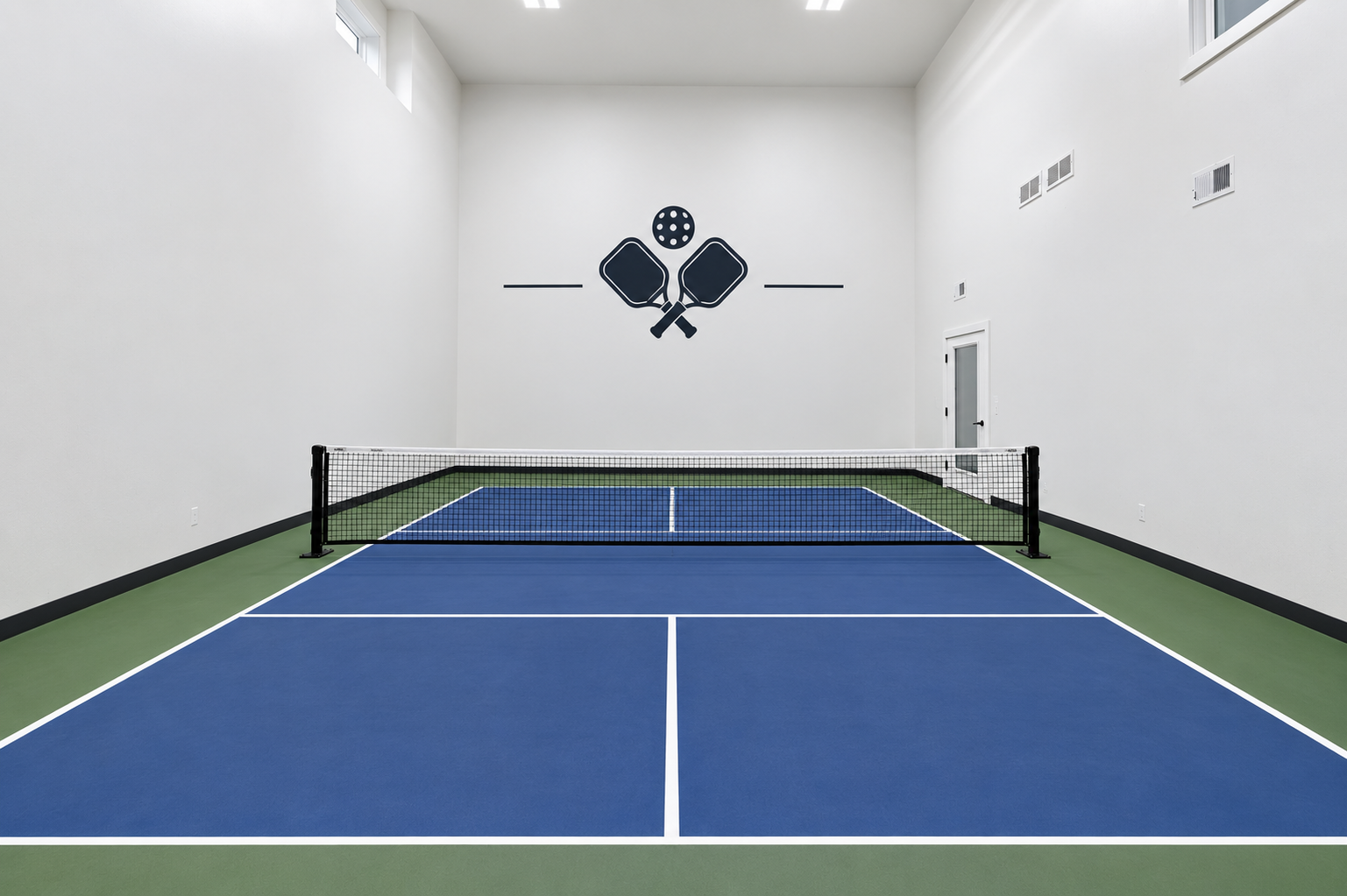 This huge space has been reimaged and virtually staged into your very own pickleball court! Image the fun to be head all winter long! VIRTUALLY STAGED