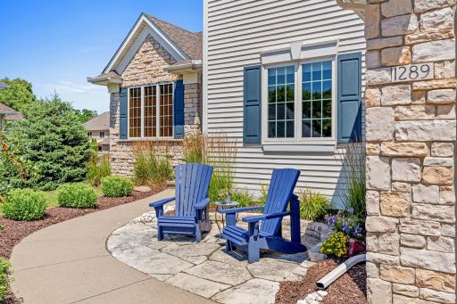 Striking rooflines, mature landscaping and a welcoming front entry create a memorable first impression.