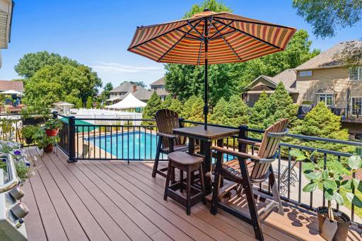 Enjoy outdoor living from the maintenance-free deck overlooking the spacious, beautifully designed backyard.