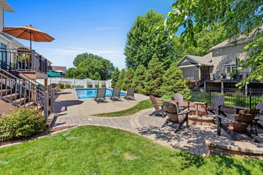 Made for Minnesota summers! Spend sunny days poolside and evenings gathered around the backyard fire pit.