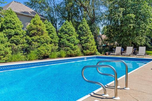 Vacation at home! The sparkling in-ground pool creates your own private backyard retreat.