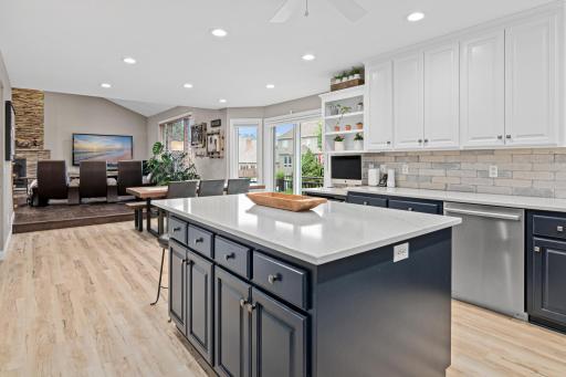 Spacious kitchen offers an open design with tons of storage and counter space. Large center island for easy meal prep or buffet style eating.
