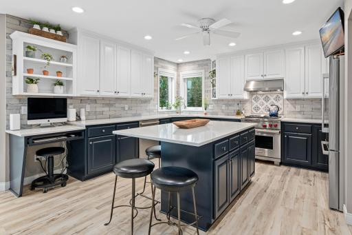 Thoughtfully designed kitchen with all the bells and whistles. Tons of storage, natural and bright lighting, beautiful stainless steel appliances and great views to the backyard.