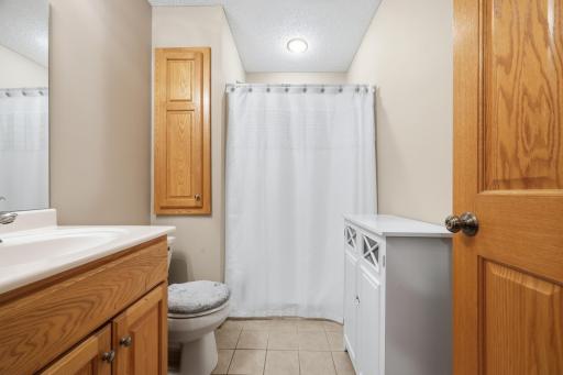 upper level bathroom Complete with tile and in floor heat.